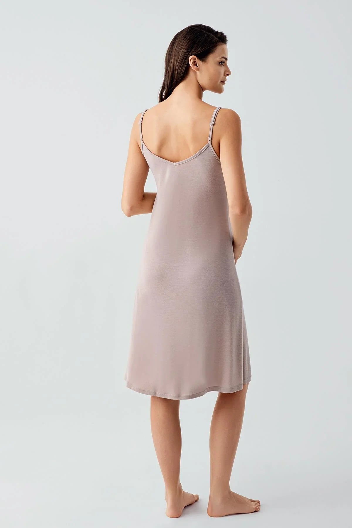 Woman wearing light pink sleeveless viscose maternity nightgown from Artış Collection