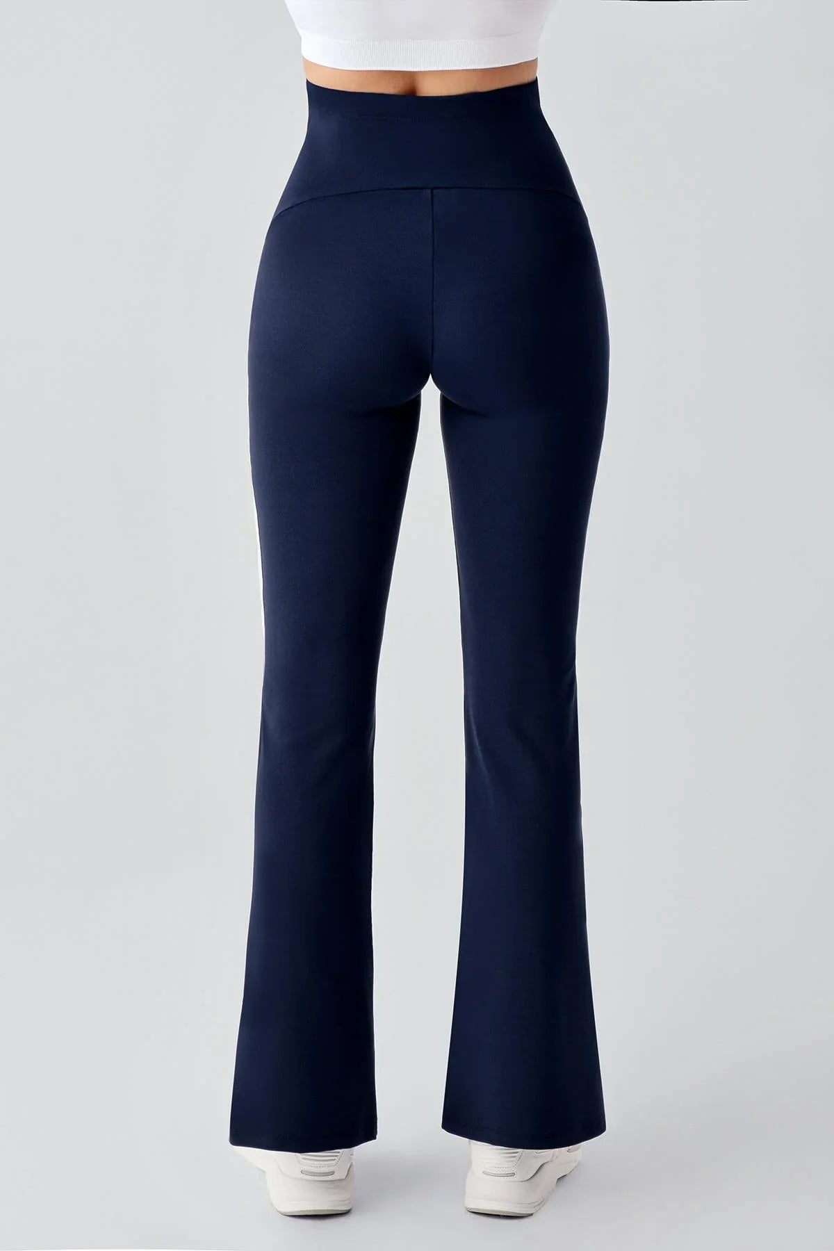 Navy blue high-waisted maternity flared leggings from Artış Collection, back view