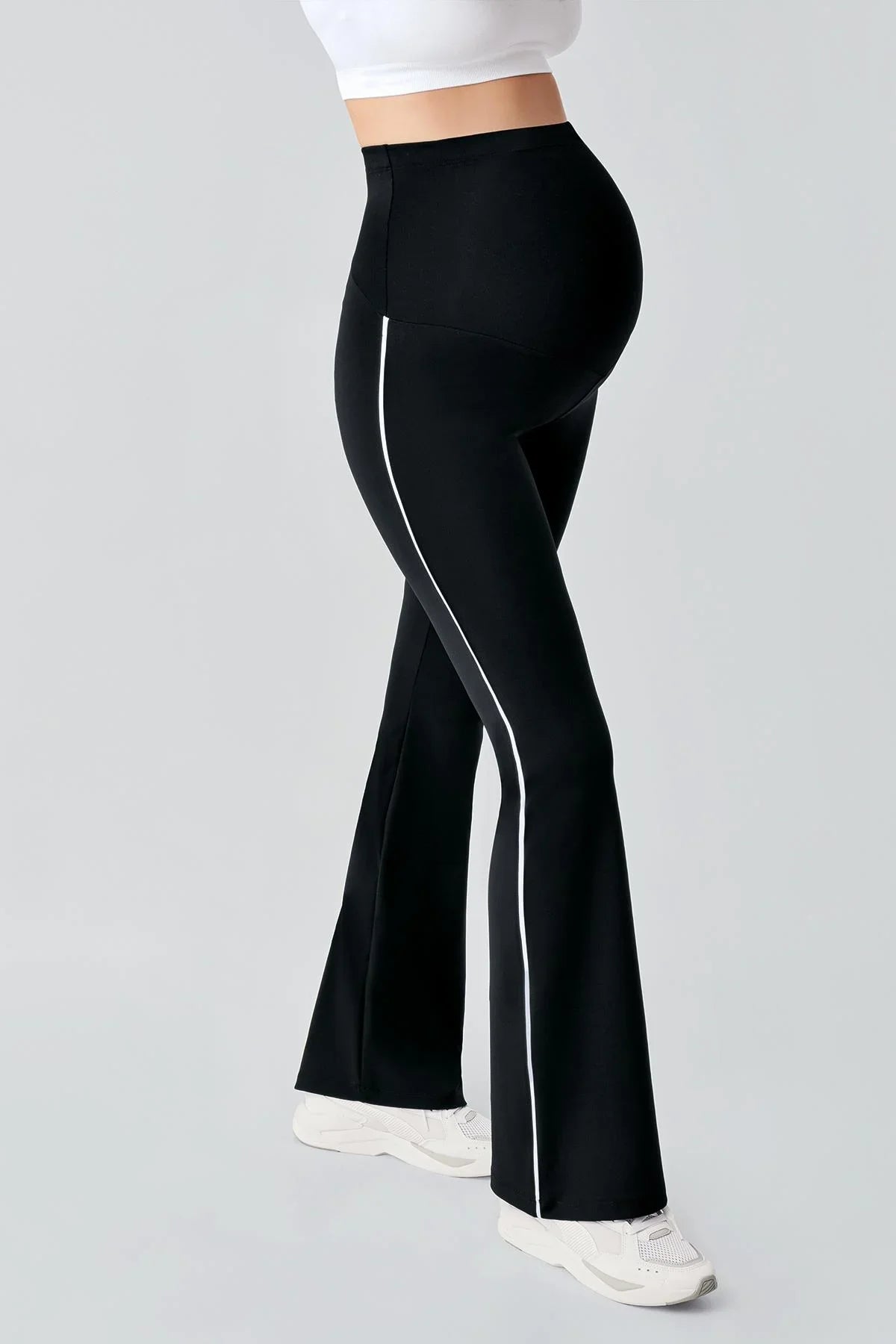 Black high-waisted maternity flared leggings with white piping, Artış Collection